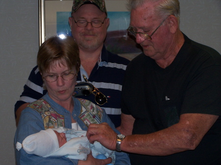 LtoR Karen holding Hannah, Me, Daddy  Apr '05