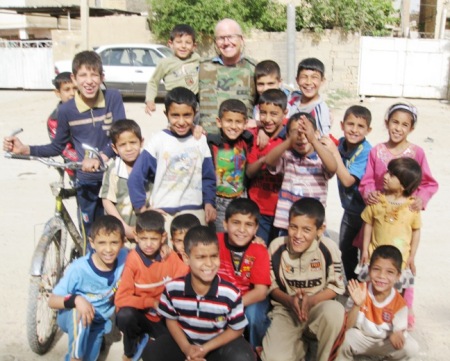 Brad with Iraqi boys in Baghdad