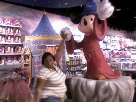 my baby girl touching her mickey mouse