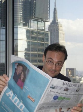 Alan reading WSJ with our ad on back cover