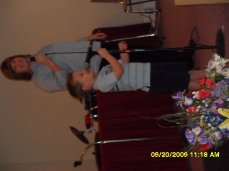 Tonya and her son Jacob singing in church