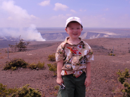 Our grandson on harden lava