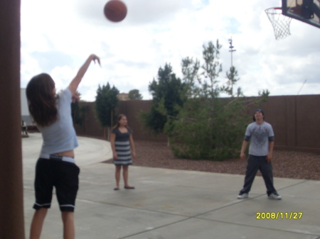 My kids and my niece Morgan playing hoop