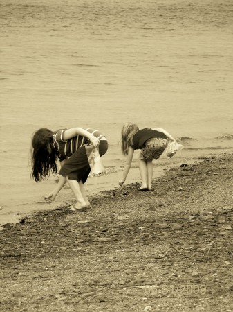 my girls picking sea glass