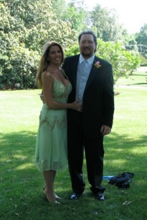 My husband Sam and I at his daughter's wedding