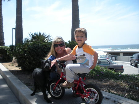Andrew, Mommy and, puppy, Kobe on the strand..
