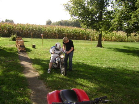 Bear teaching his brother how to ride.