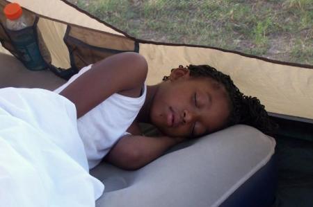 Kayla sleeping at campout
