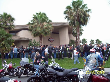 The crowd in front of the dealership