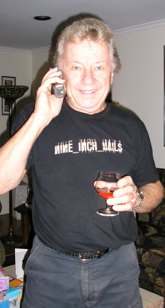 My father in his NIN shirt. :D