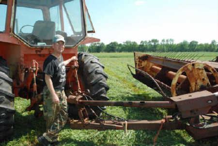 Mike cutting Hay