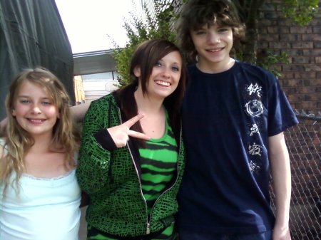 Stone and 2 of his 3 sisters - May 09