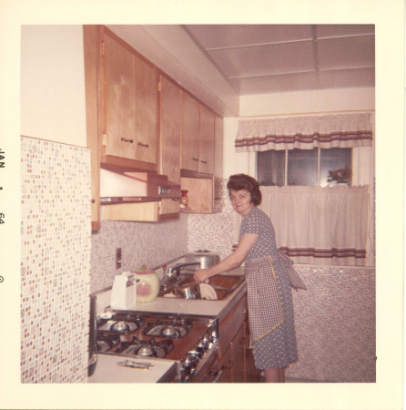 Mom washing dishes, January 1964