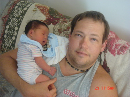 me and tyler 2 weeks old