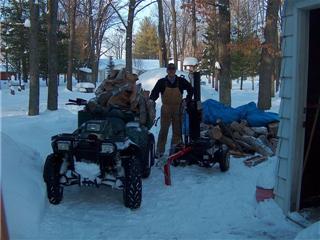 cutting   wood to stay warm in the winter