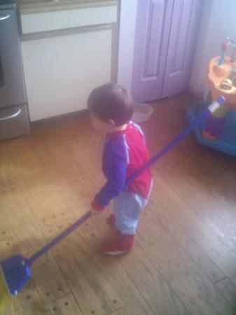 Ethan helping Mommy clean