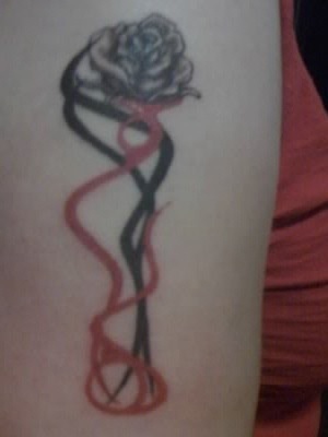 rose on arm Fourth Tattoo