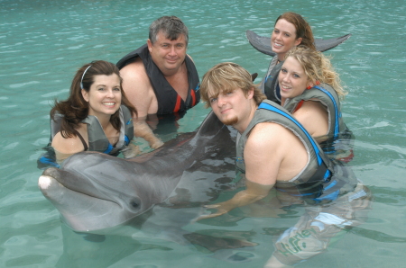 Family photo with pet dolphin