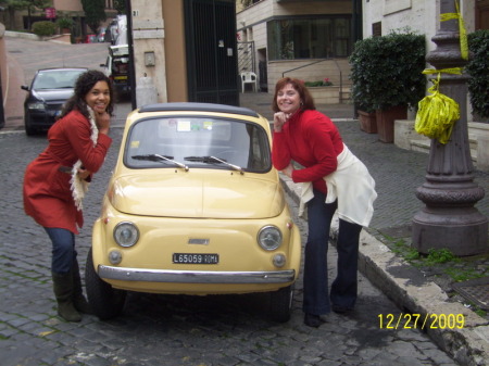 Monet's Idea to pose by the Italian cars.