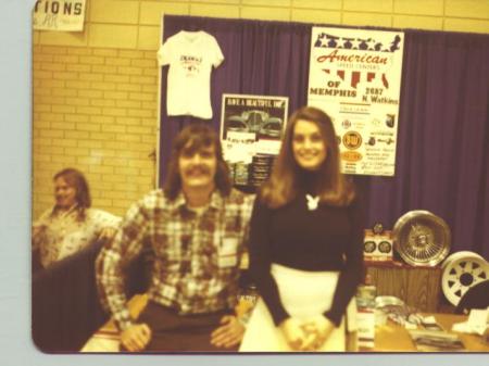 1975? Car show with Playboy Playmate.