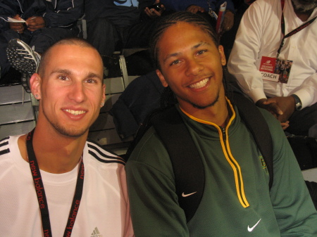 Chris, Jr. poses with Jeremy Wariner