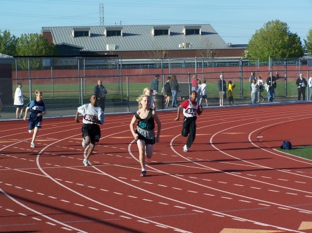 Nathan running the 200 as a 7th grader