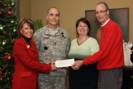 Receiving donation at Fisher House