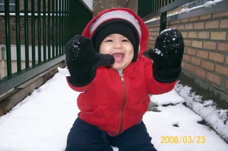 201_2219  Showing his hands with snow.