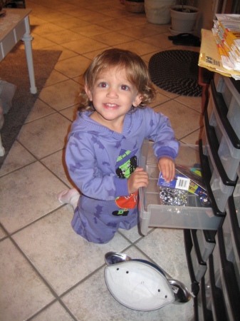 Addison helping Nana crafting