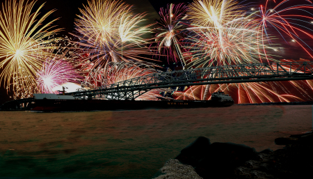 Bridge and ship with fireworks