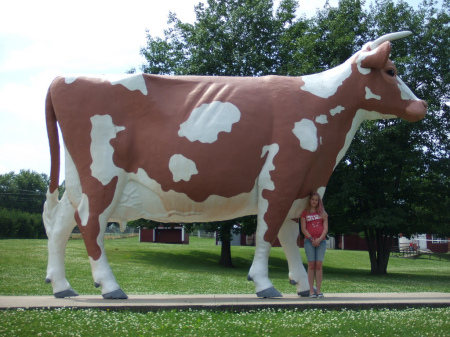 Rockford - C Standing by Giant Cow
