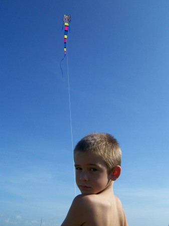 Parker flying a kite.