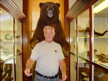 HERES JIMMY WITH A Bear behind