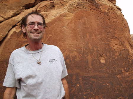 Tom in front of petroglyphs