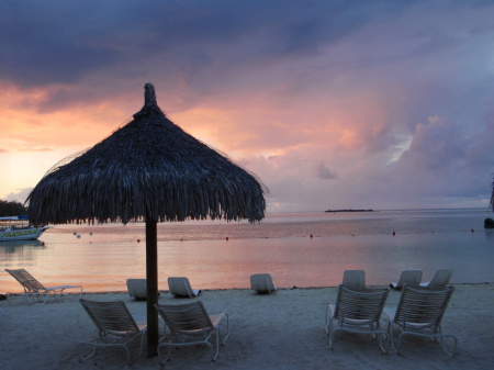 Tahitian sunset with umbrella