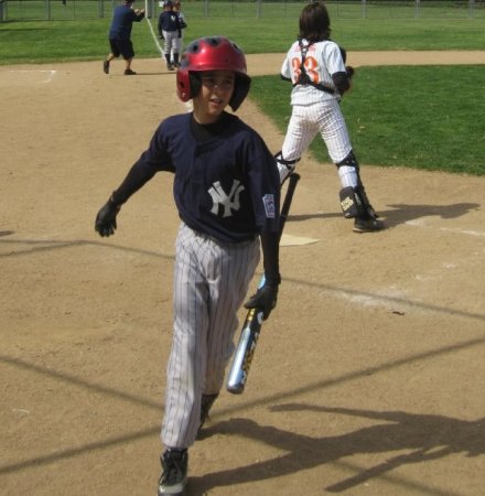 kennedy picking up bat