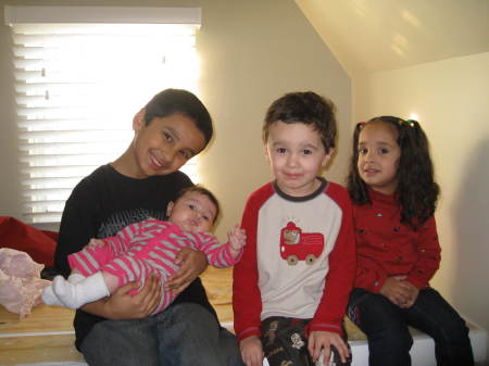 my two grandkids with niece and nephew