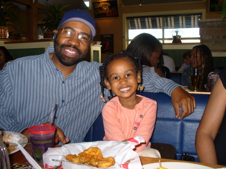 Grand dad and Janae in Atlanta pigging out