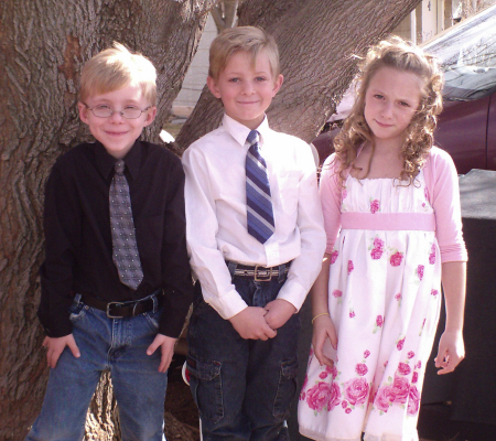 Rion, Aaron, and Kristina after Church. CUTE