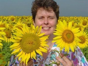 Linda Pottberg in a Sunflower field in Romania