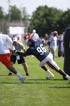 #96 Alex Brown going thru a Quarterback sack