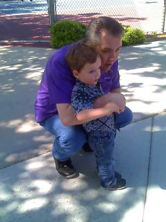 Our grandson with my husband