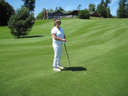 Jill playing golf
