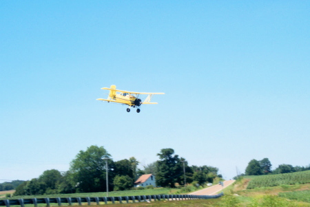 Crop duster near our property in TN