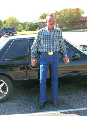 An old man and a Mustang