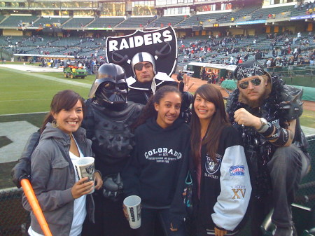 Daughters and friend at 2008 Raider game.