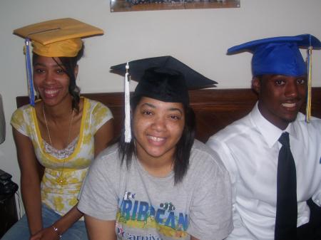 My Children with their graduation caps on