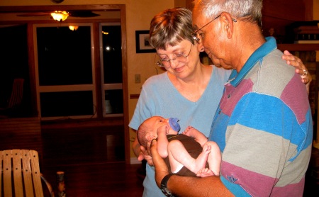 George and me with our 3 week old grandson.