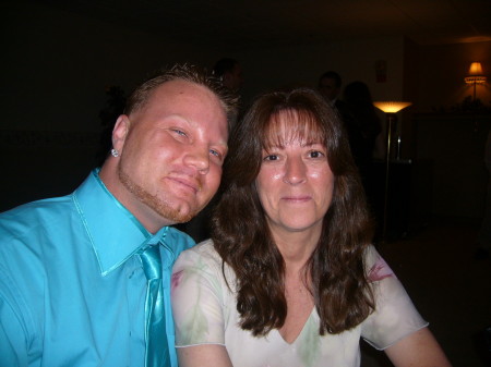 Me and my oldest son PJ at a cousin's wedding