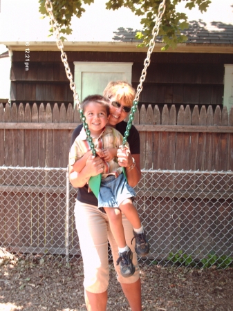 Aunt Lynn swinging Walter.......at his school....He is a twin!